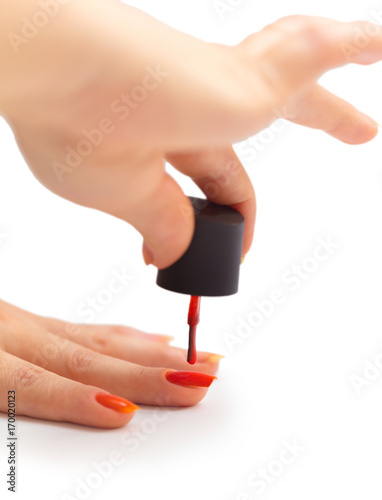 nail painting with red lacquer