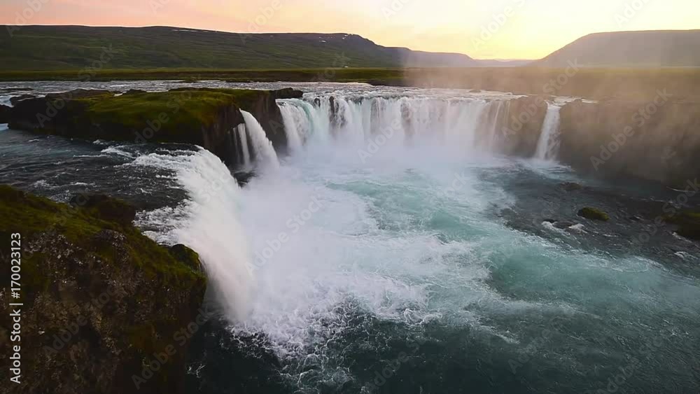 Fantastic sunset. Godafoss very beautiful Icelandic waterfall 12 meters high. It is located in the north near Lake Myvatn. Fantastic sunset. Godafoss very beautiful Icelandic waterfall 12 meters high. It is located in the north near Lake Myvatn.