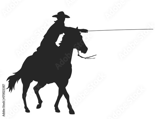 cowboy with lasso riding a horse