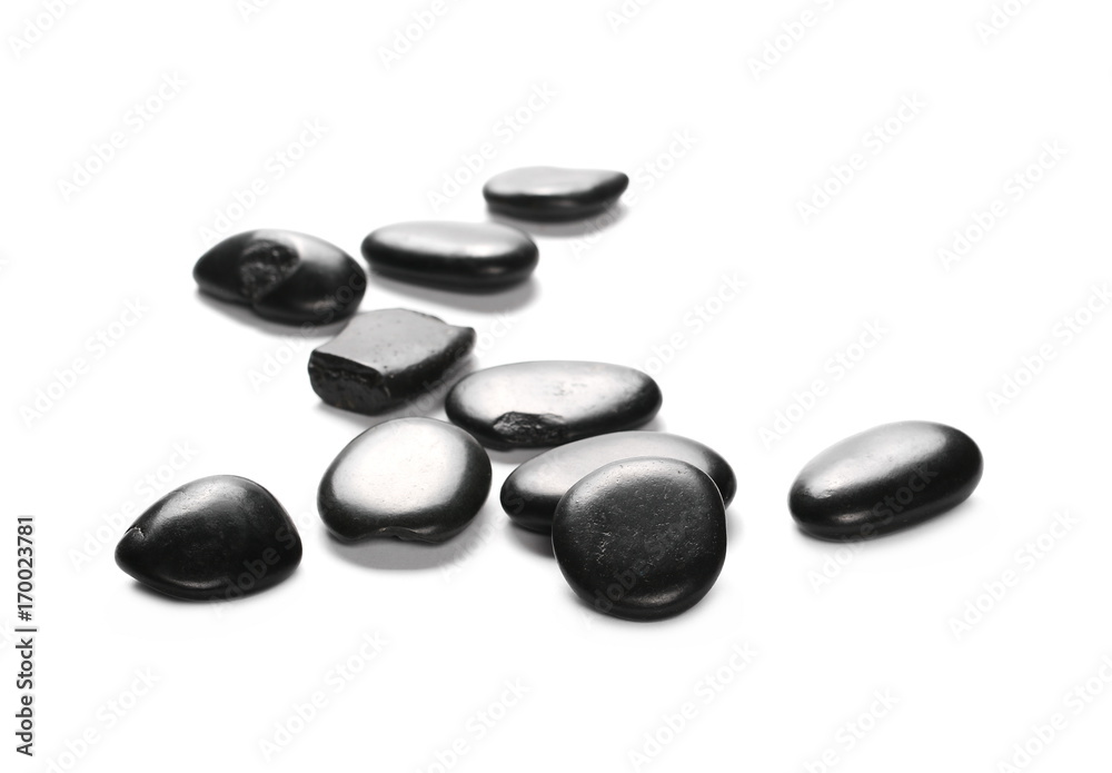 Pile black rocks isolated on white background and texture Pile black rocks isolated on white background and texture