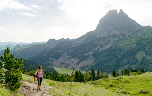 woman hiker with Pic du Midi d'Ossau in the French Pyrenees