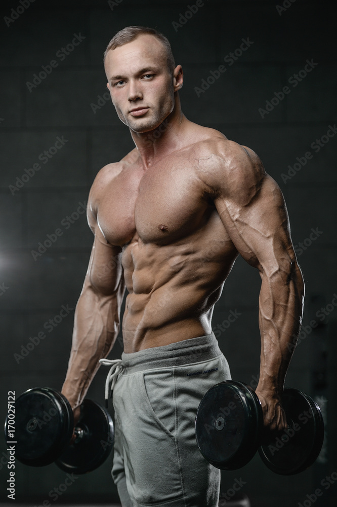 young man train in gym healthcare lifestyle sexy caucasian man young man train in gym healthcare lifestyle sexy caucasian man