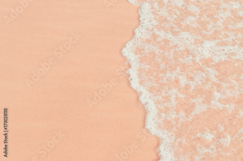 Copy space smooth wave beach with sand texture abstract background.
