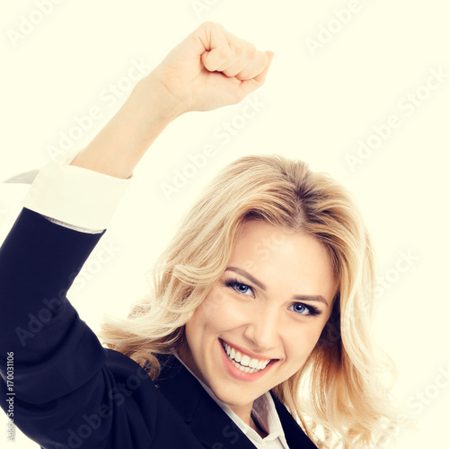 Happy gesturing young cheerful businesswoman