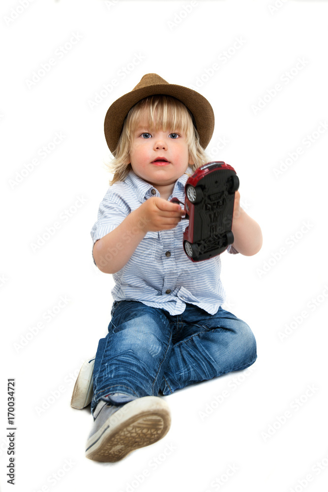 little boy playing with a toy car little boy playing with a toy car