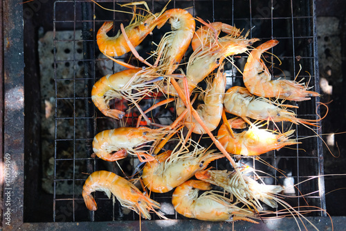 Fresh shrimps grilled on grill