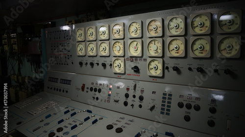Close up picture of old grey panel for controling a big atomic engine of icebreaker.