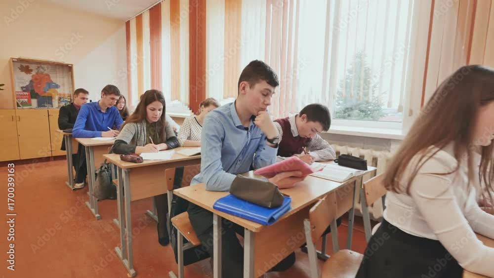 Students in the classroom are at their desks. Russian school. Students in the classroom are at their desks. Russian school.