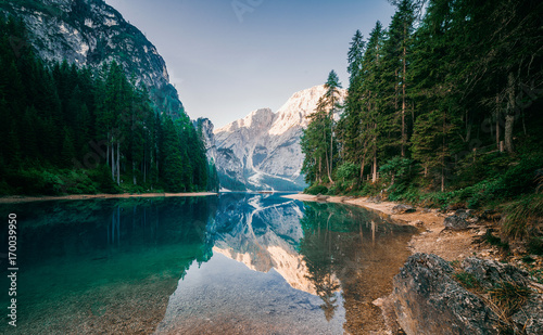 Amazing view of Lago di Braies (Braies lake, Pragser wildsee) at sunrise. Trentino Alto Adidge, Dolomites mountains, Italy.
