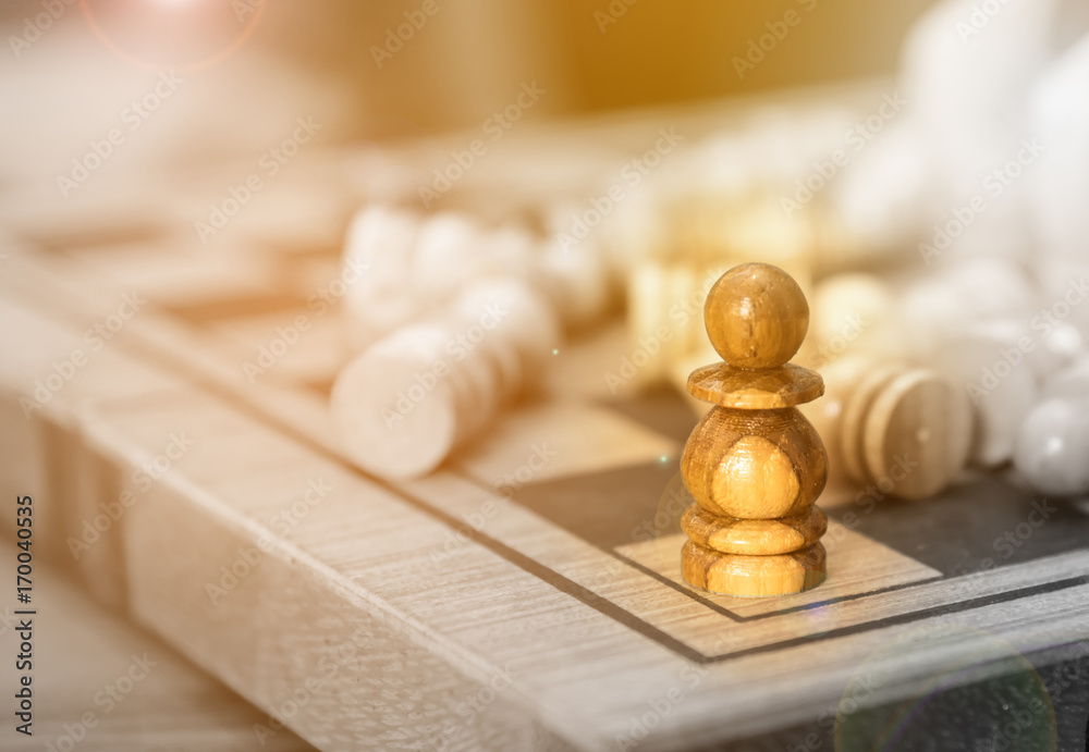 Close up of wood chess pieces on the board, shallow depth of field,Victory Strategy business concept Close up of wood chess pieces on the board, shallow depth of field,Victory Strategy business concept