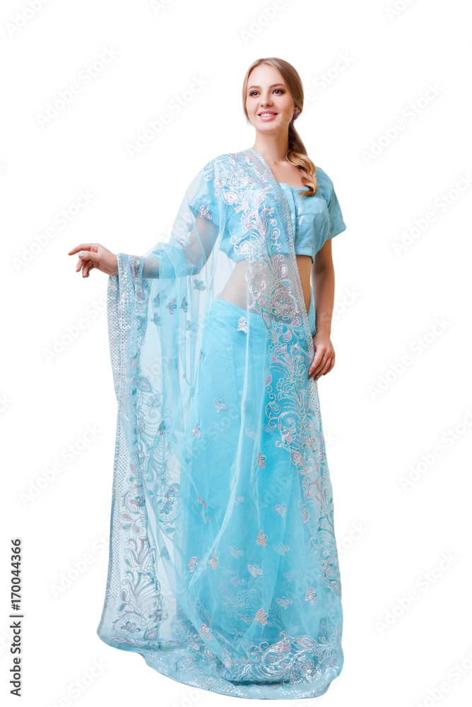 Caucasian young woman in blue indian national dress isolated Caucasian young woman in blue indian national dress isolated