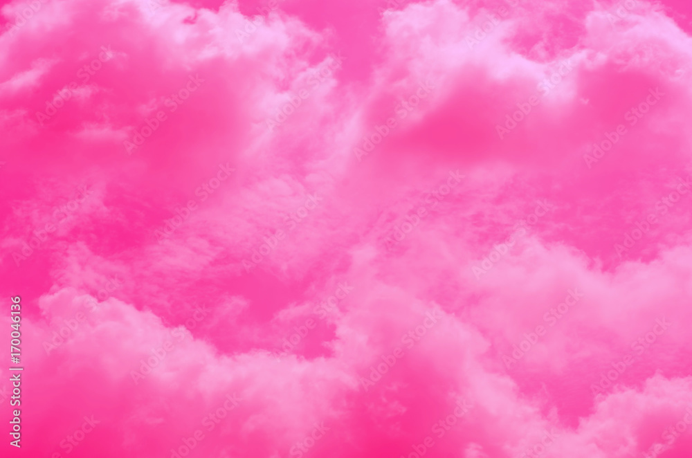 Pink sky background with white clouds