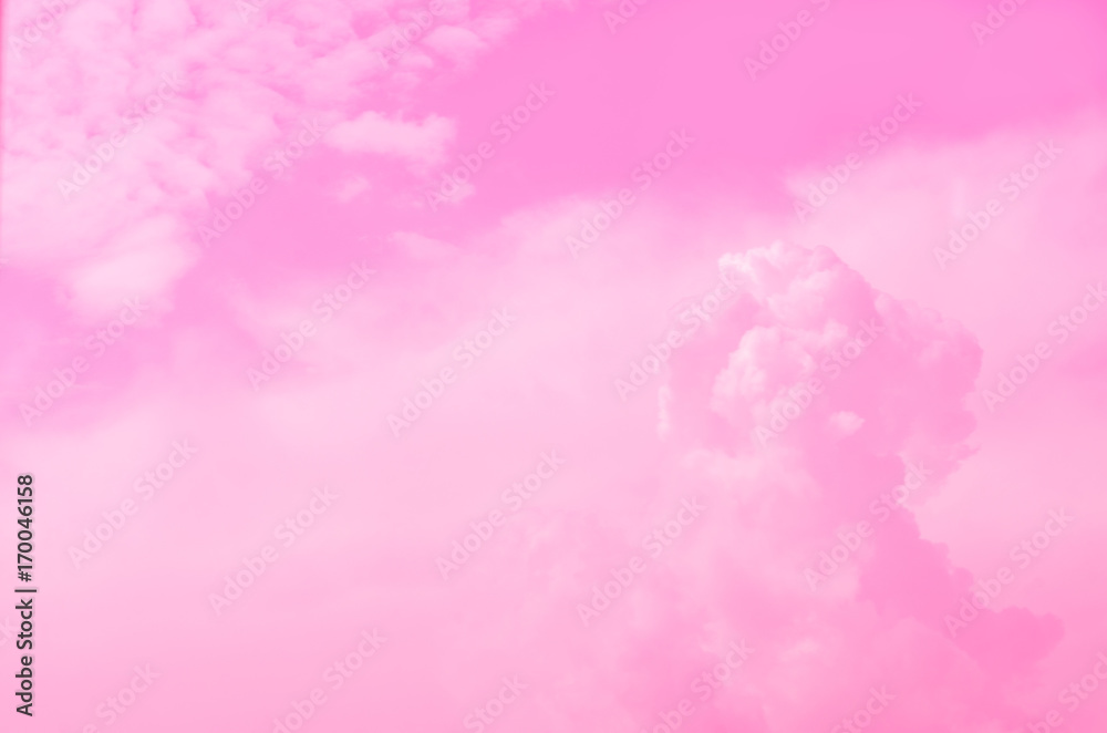 Pink sky background with white clouds