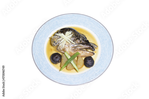 Salmon head cooked stew with sweet sauce on white background,japanese food