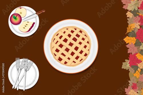 Top view of the apple pie and sliced apples