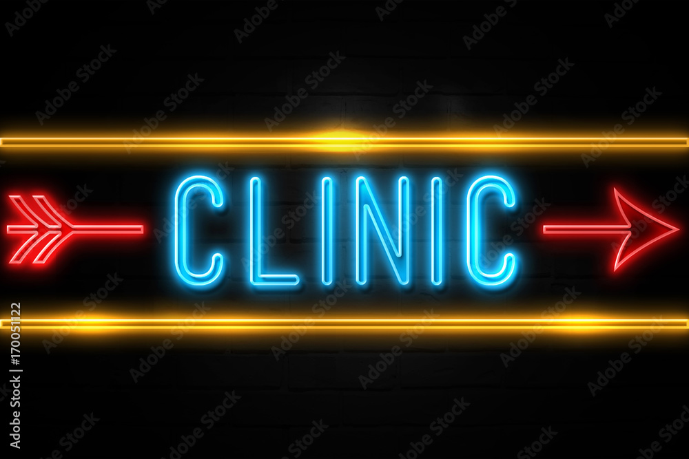 Clinic - fluorescent Neon Sign on brickwall Front view Clinic - fluorescent Neon Sign on brickwall Front view