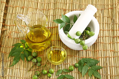 Photos Neem Ayurvedic Oil with Mortar and Pestle