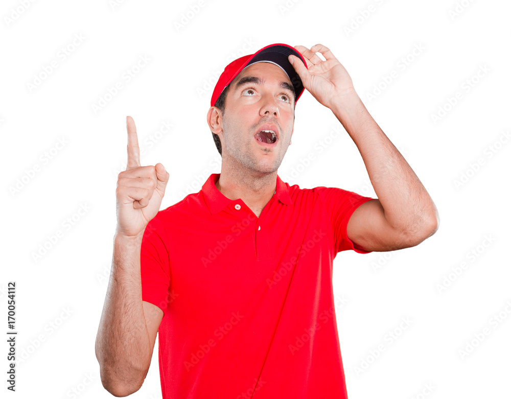 Surprised delivery man pointing up Surprised delivery man pointing up