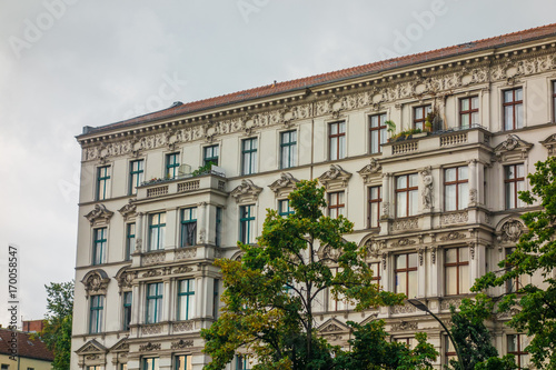 white apartment building with ornaments