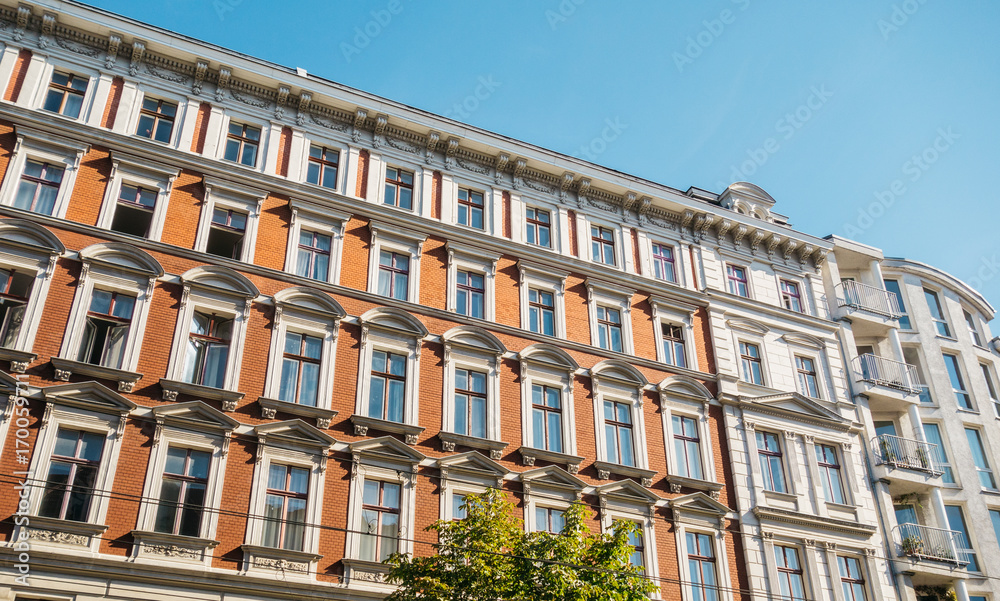 orange brick facaded building with white frames orange brick facaded building with white frames