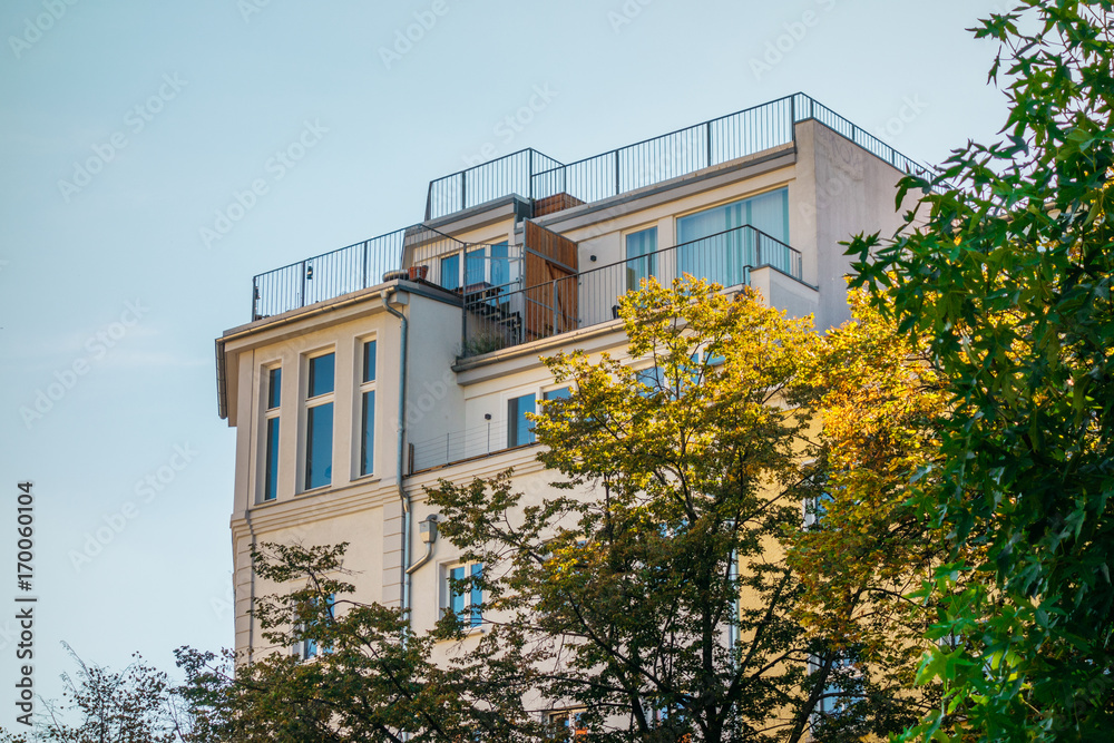 Obraz premium luxury house with beautiful autumn trees