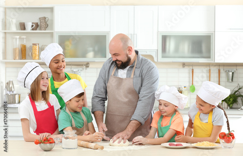 Group of children and teach...