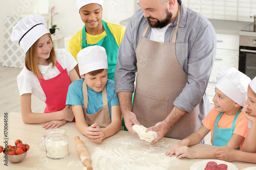 Group of children and teach...