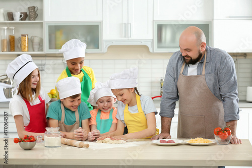 Group of children and teach...