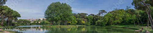 Eur area park outdoor lake, a big green park bihind the city center. A green meadow for relax time in Rome