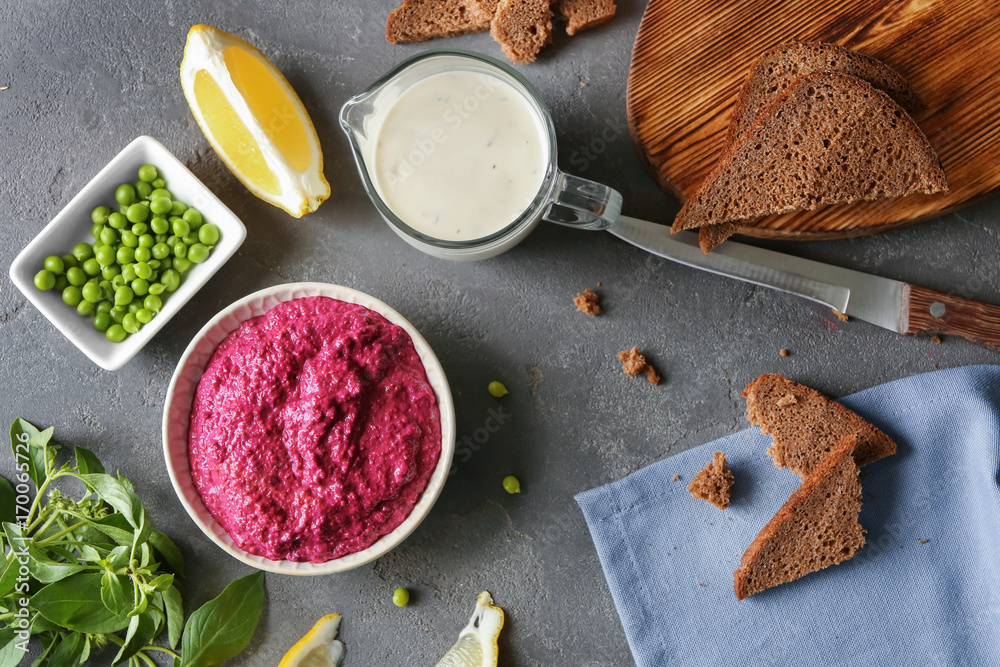 Bowl of fresh beet hummus on table Bowl of fresh beet hummus on table