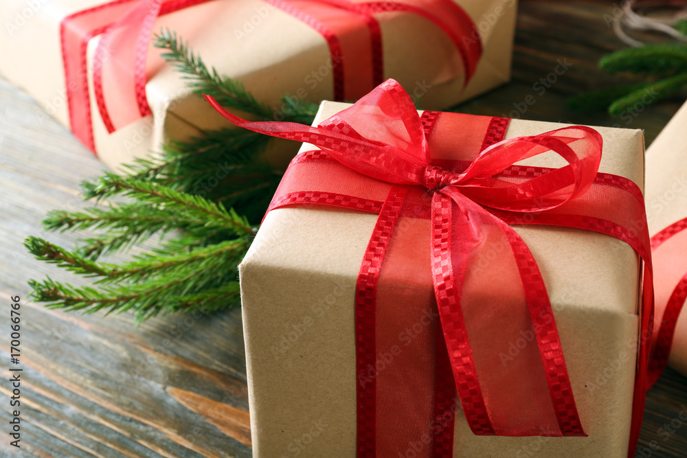 Christmas gift box on table, closeup Christmas gift box on table, closeup