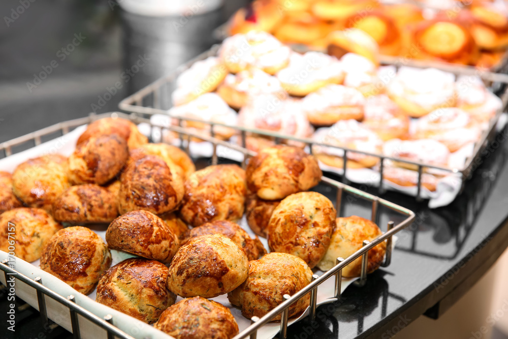 Different kinds of bakery products in baskets at buffet Different kinds of bakery products in baskets at buffet