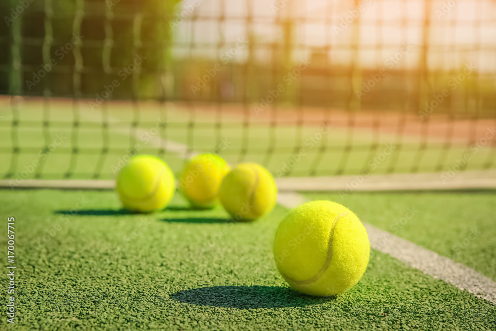 Tennis balls on modern court