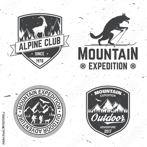 Vintage typography design with mountaineers and mountain silhouette.