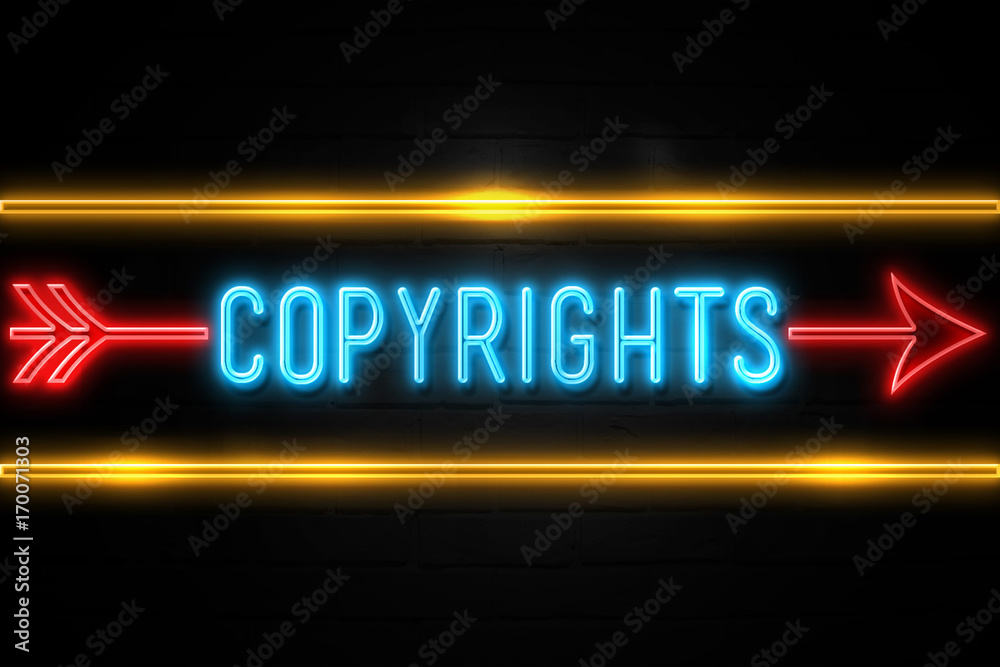 Copyrights  - fluorescent Neon Sign on brickwall Front view