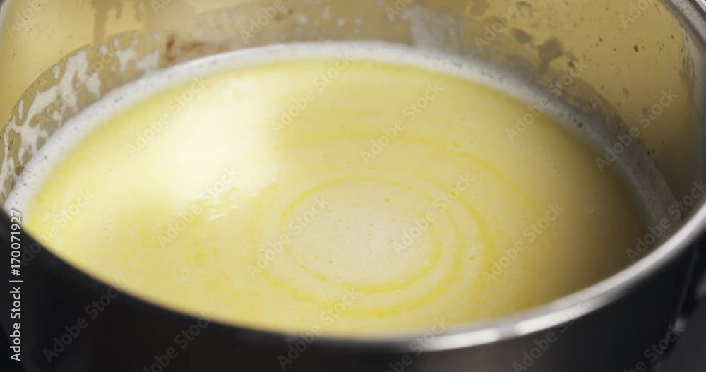 spinnin mix of melted butter with water spinnin mix of melted butter with water