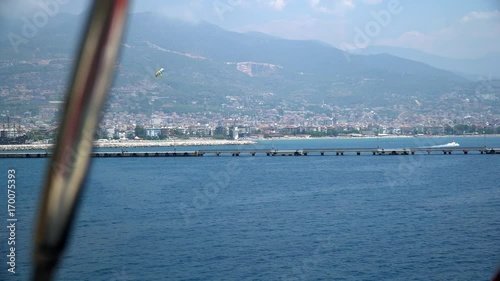 раrasailing over the sea photo