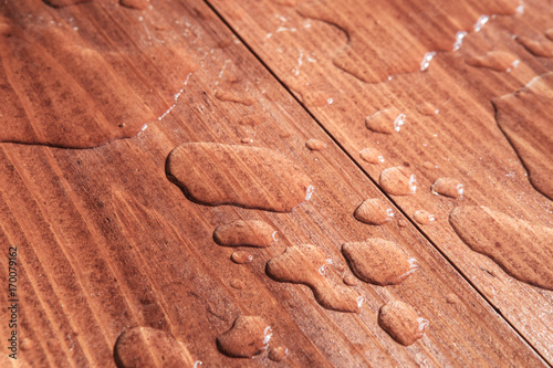 water drops on wooden board