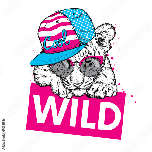 Fototapeta Naklejka Na Ścianę i Meble -  A beautiful tiger cub with glasses and a cap. Vector illustration for a postcard or a poster, print for clothes and accessories. Wild tiger. Fashion & Style. American flag. The Patriot of the USA.