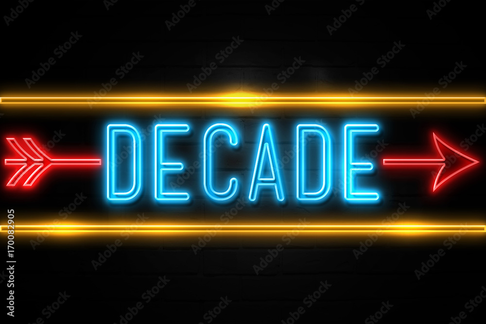 Decade - fluorescent Neon Sign on brickwall Front view Decade - fluorescent Neon Sign on brickwall Front view
