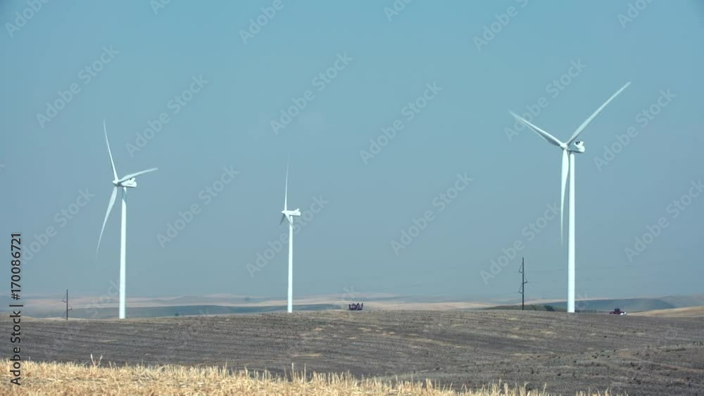 Wind Turbines, Washington State 4K. UHD. Wind turbines operating on agricultural land in Washington State. 4K. UHD.
Wind Turbines, Washington State 4K. UHD. Wind turbines operating on agricultural land in Washington State. 4K. UHD.