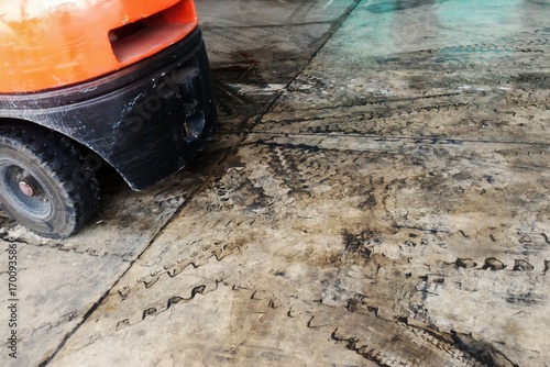 tire track of forklift on cement floor