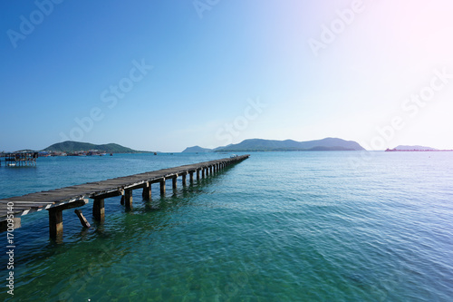 Wooden bridge into the sea. Property is located at the end of the runway into the sea