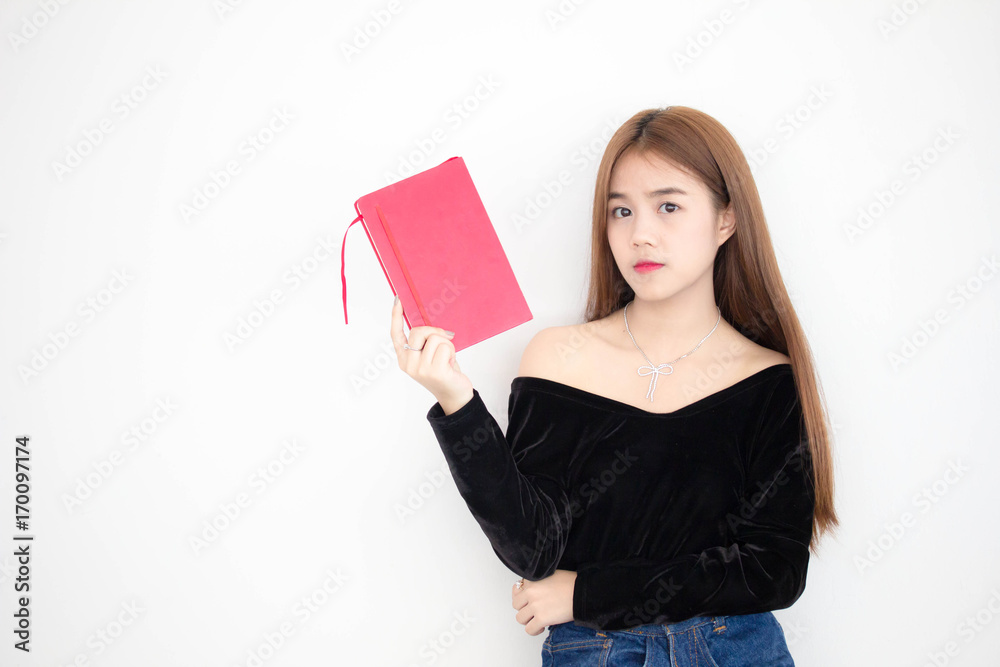Portrait of thai adult beautiful girl reading red book Portrait of thai adult beautiful girl reading red book