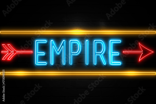 Fotografija Empire  - fluorescent Neon Sign on brickwall Front view