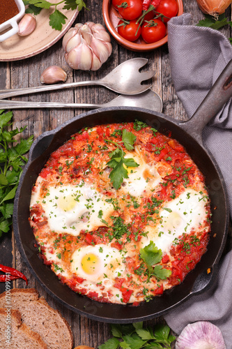 fried egg with bell pepper and tomatoes