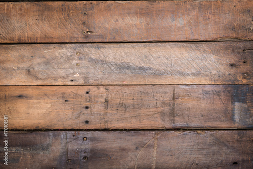 Close up top down view of wood texture of old wood use as natural background with applied vintage retro filter effect.
