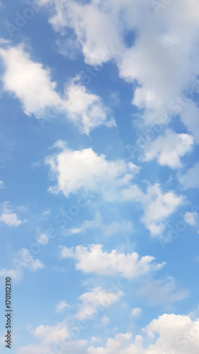 Fresh blue sky with spread white clouds