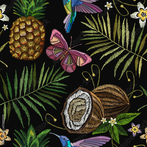 Embroidery humming bird, palm tree leaves, pineapple, butterflly, coconut tropical seamless pattern. Fashionable embroidery tropical butterfly, summer background. Template for design of clothes