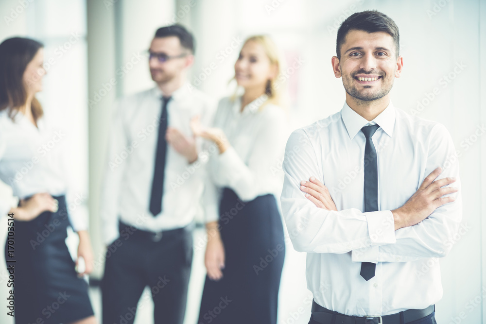 The smile businessman stand near partners The smile businessman stand near partners